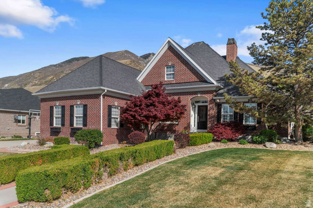 Stunning Shadowlands Estate on 0.6-Acre Corner Lot! This meticulously maintained 4,890 sq. ft., 6 bedroom brick rambler offers the perfect blend of luxury, and location. The main floor features a modern kitchen with granite counters, gas appliances, and a seamless flow into the formal dining and executive office. Rare layout includes 3 bedrooms and 3 full baths on the main level, featuring a grand primary suite and a secondary en-suite. The daylight basement is flooded with southern-exposure sunshine, offering a massive great room, a private theater room (projector/screen included), and a convenient second kitchen. Outside, enjoy a sprawling, fully fenced backyard with a large patio and breathtaking mountain views. Adventure is at your doorstep with running and biking trails directly behind the home. Complete with a 4-car garage capacity (3 attached, 1 detached) and located in the Corner Canyon High boundaries. Freshly painted, with new carpet throughout, this home is move-in ready!