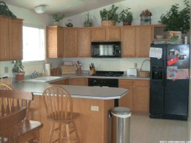 7909 Cliff Side Dr, Sandy, UT 84094 — photo 5