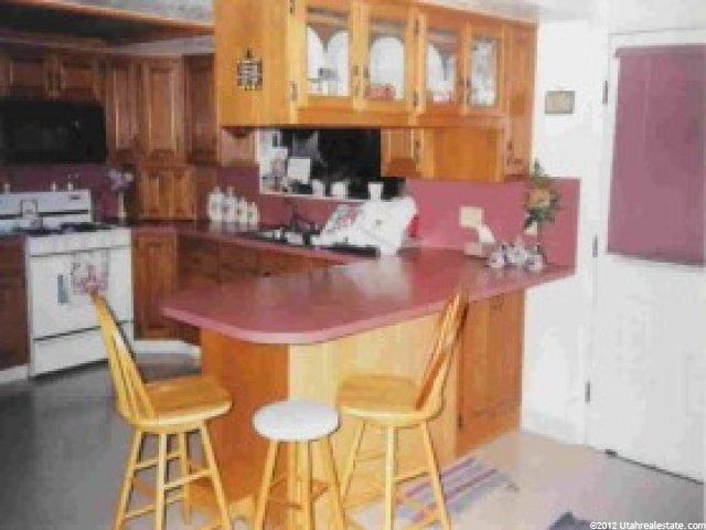 718 N Main St, Garland, UT 84312 — photo 3