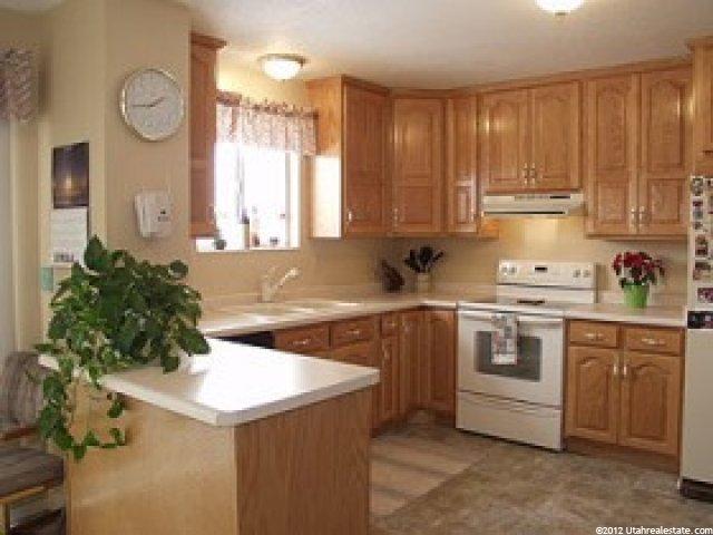 5293 Leprechaun Ln, Kearns, UT 84118 — photo 4