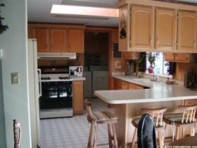 7341 Foothill Dr, Lake Point, UT 84074 — photo 3