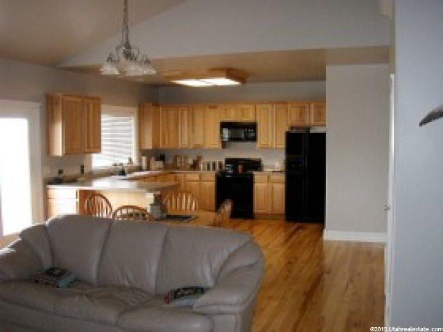 3219 N Pelican Dr, Farr West, UT 84404 — photo 2