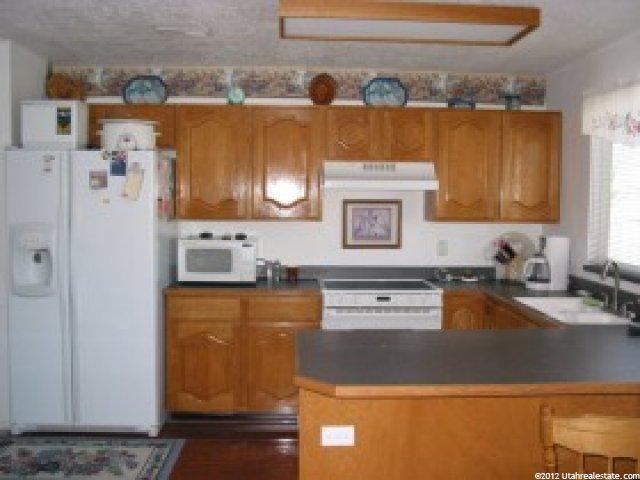 6074 S Dewdrops Dr, Kearns, UT 84118 — photo 2