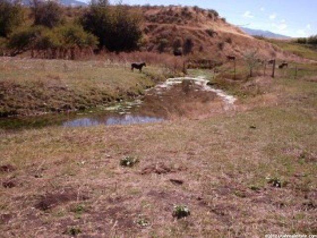 390 E Cannibal Rd, Cove, UT 84320 — photo 2