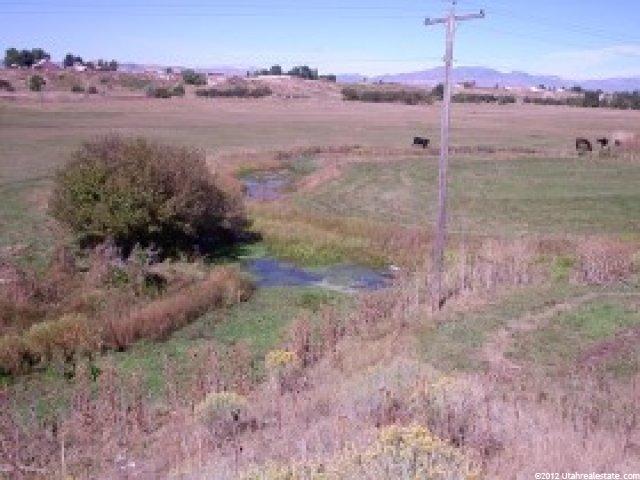 390 E Cannibal Rd, Cove, UT 84320 — photo 8