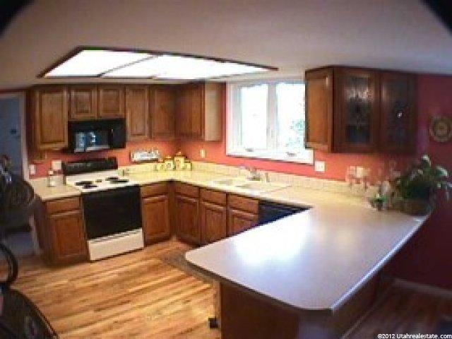 9860 S Solomon Cir E, Sandy, UT 84092 — photo 2