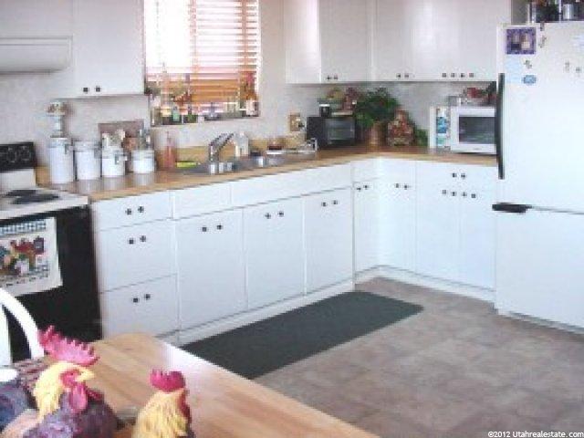 5267 S 2375 W, Roy, UT 84067 — photo 2