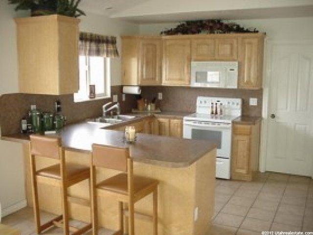 3178 N Pelican Dr, Farr West, UT 84404 — photo 4