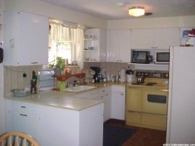 1040 S Hislop Dr E, Ogden, UT 84404 — photo 3