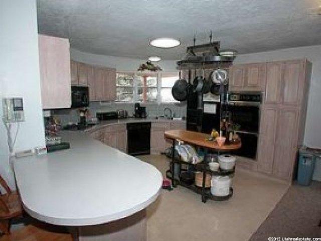 8626 S Scottish Dr E, Sandy, UT 84093 — photo 2