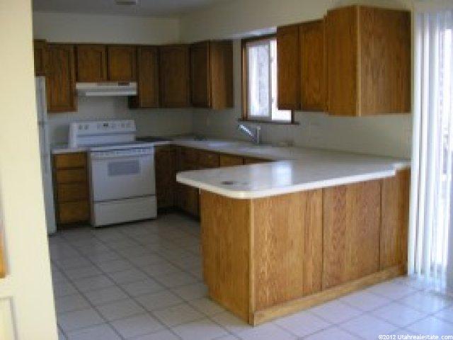 1030 E Country Hills Dr, Ogden, UT 84403 — photo 2