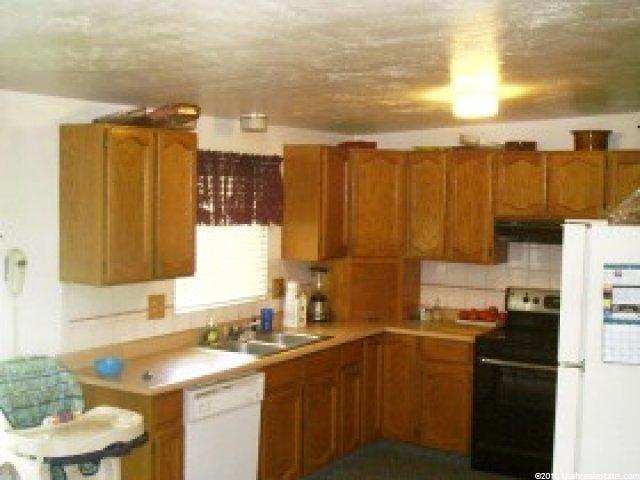 7290 S Ramanee Dr E, Midvale, UT 84047 — photo 3