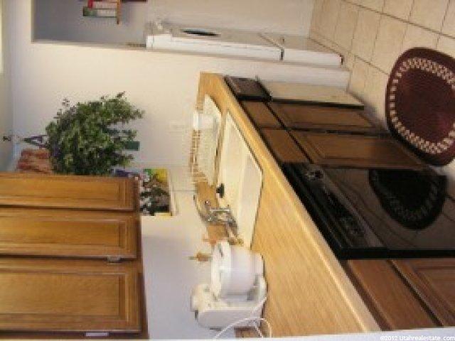 6908 S Countrywoods Cir E #E28, Midvale, UT 84047 — photo 4