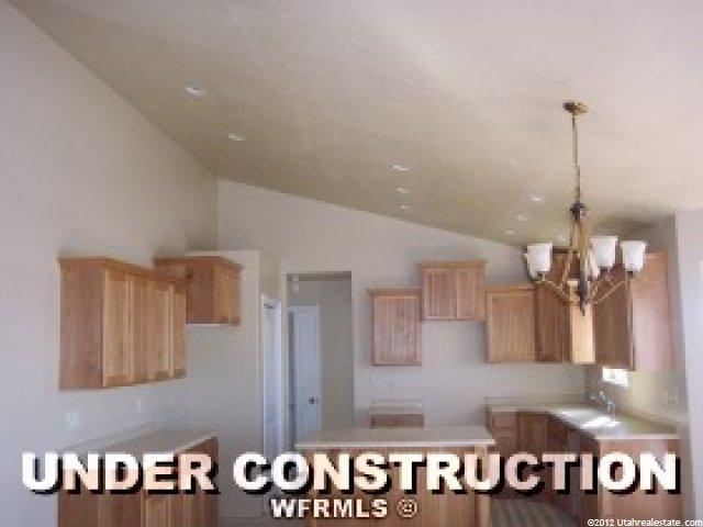 1027 Mountain Orchard Dr, Pleasant View, UT 84404 — photo 2