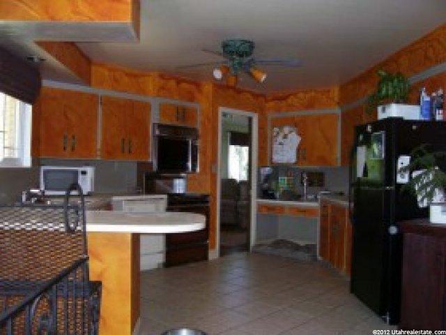 4463 S Forest Green Dr E, Ogden, UT 84403 — photo 3