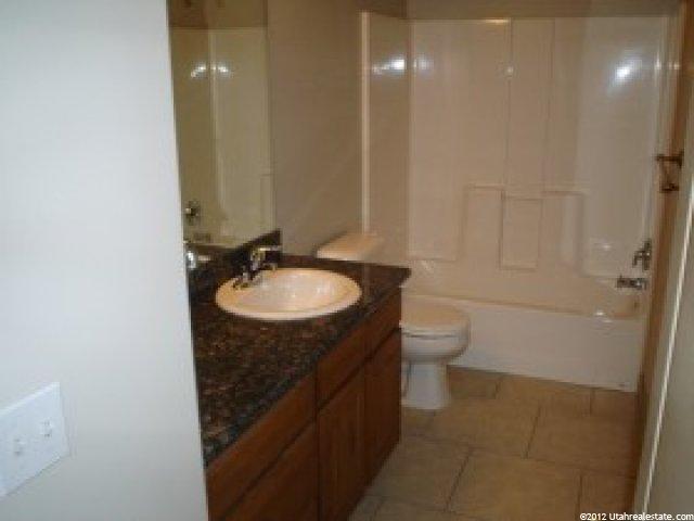 261 E Twin Bridges Ln, Midvale, UT 84047 — photo 10