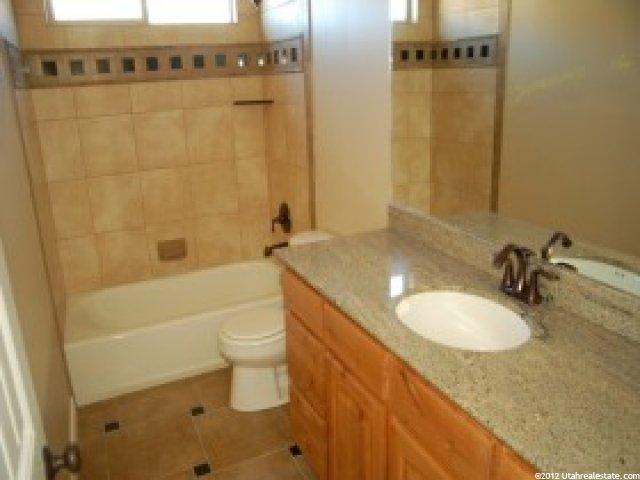 7316 Ridge Rd, Lake Point, UT 84074 — photo 10
