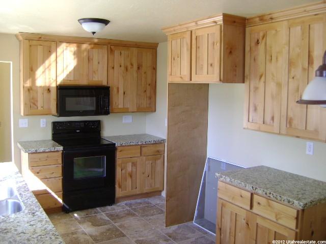 9434 S Poppy Ln E, Sandy, UT 84094 — photo 2