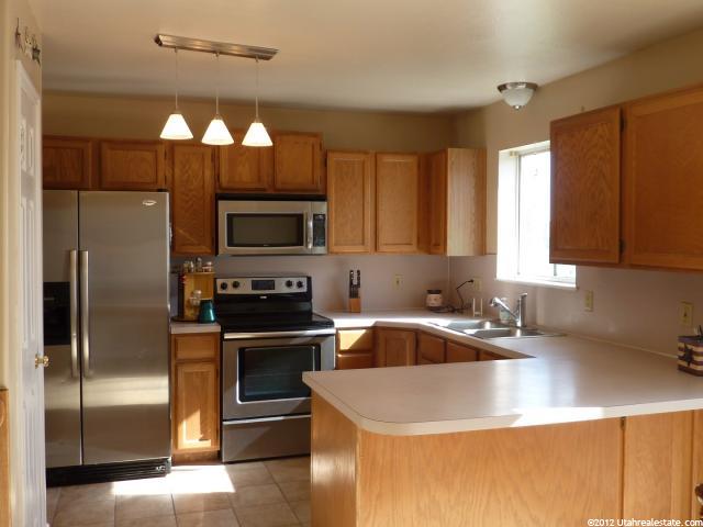 1295 S Riverview Dr E, Garland, UT 84312 — photo 2